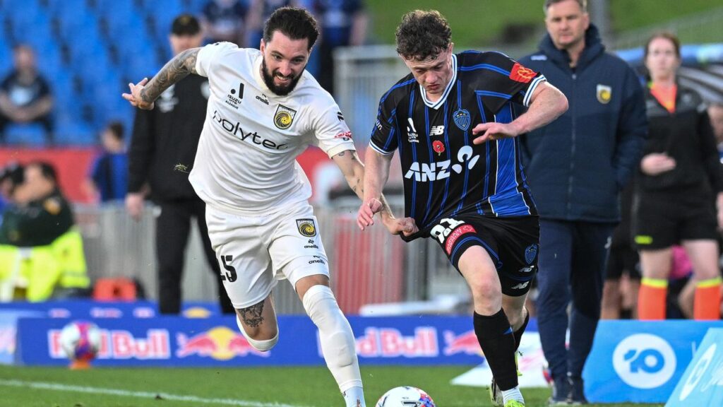 The determination of Storm Roux (left) was typical of the Mariners’ grit against Auckland FC. 
