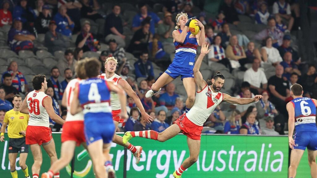 Aaron Naughton, taking a mark in the loss to the Swans, is expected to have avoided serious injury.
