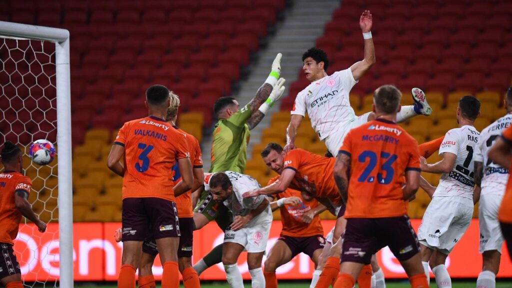 Marcus Younis (top) scored two goals and had this effort disallowed as Mebourne City beat Brisbane.
