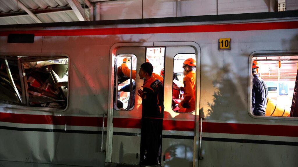 Authorities say four people have died after one train hit another at a station outside Jakarta.
