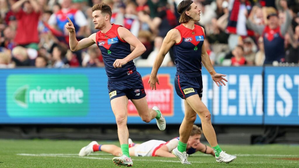 Melbourne have brought premiers Brisbane down to earth in a thrilling two-point win at the MCG.
