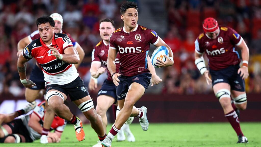 Kalani Thomas leads the Queensland Reds on attack in their win over the Crusaders.
