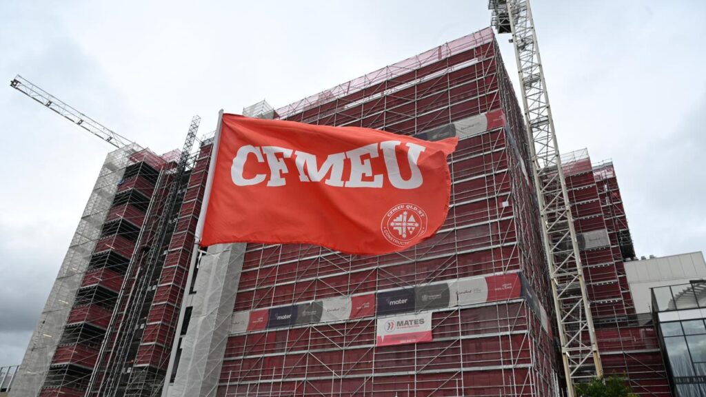 Unionists flying the CFMEU flag at construction sites have been criticised at an inquiry.
