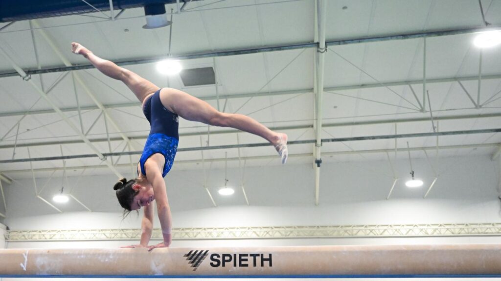 Kate McDonald in action on the beam ahead of chasing a place at the Glasgow Commonwealth Games.
