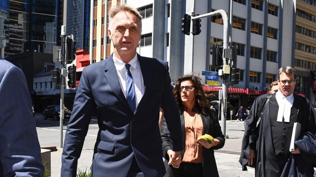 Fraud charges against Neil Brooks and his wife Linda have been dropped after almost a decade.
