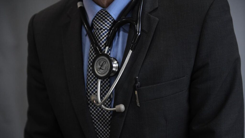 A former doctor has been charged with 148 offences including 94 counts of rape.
