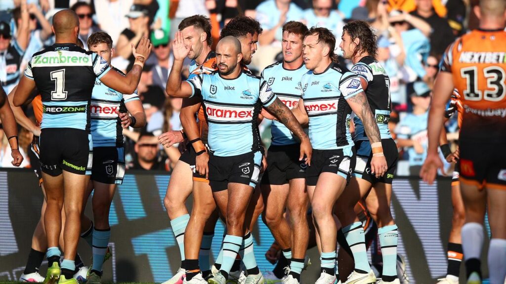 Cronulla went on a try-scoring rampage to bring Wests Tigers crashing back down to earth.

