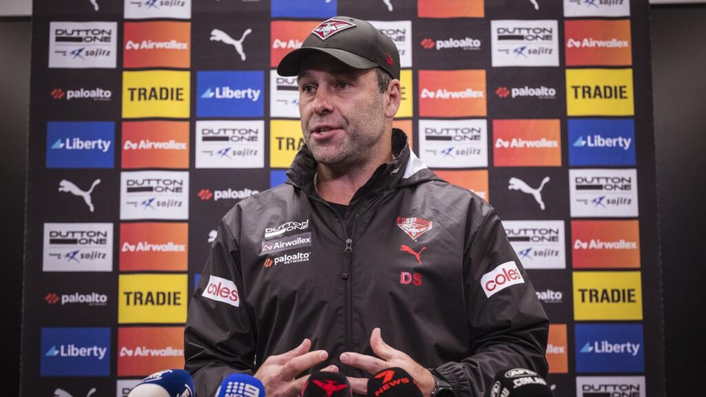 Ex-Essendon board member and current interim coach Dean Solomon won’t consider the full-time job.
