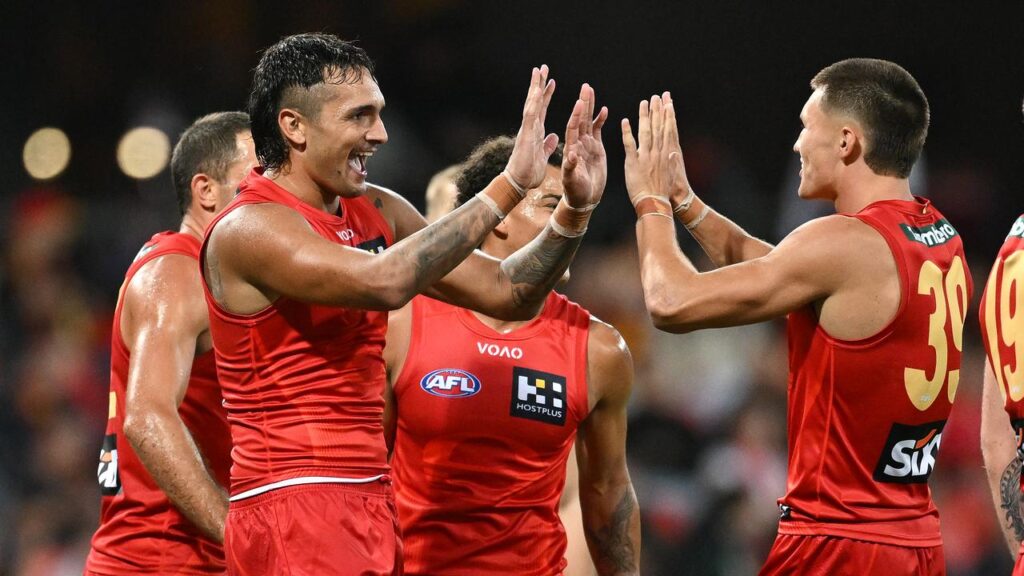 Jamarra Ugle-Hagan (l) kicked three goals in his second game for the Suns, a 20-point win over GWS.
