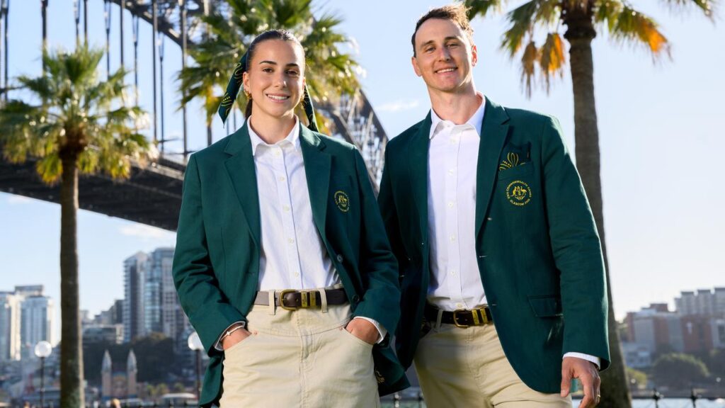 Delta Amidzovski and Cam McEvoy model the Australian Commonwealth Games ceremony uniform.
