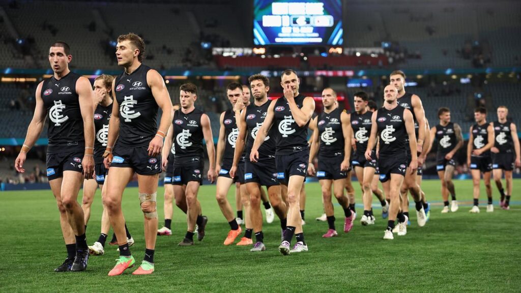 Carlton players walk off after their latest AFL defeat to St Kilda.
