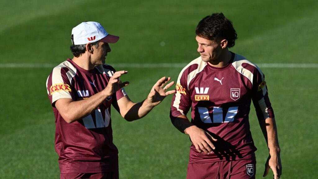 Queensland coach Billy Slater and Kalyn Ponga talk tactics in Maroons camp.
