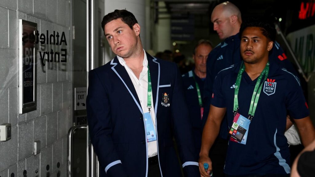 An injured Mitchell Moses (left) arrives ahead of Game 1 of State of Origin in Sydney.
