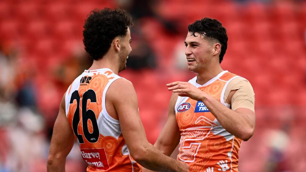 Finn Callaghan (r) has led GWS to a second straight win with a comfortable defeat of Melbourne.
