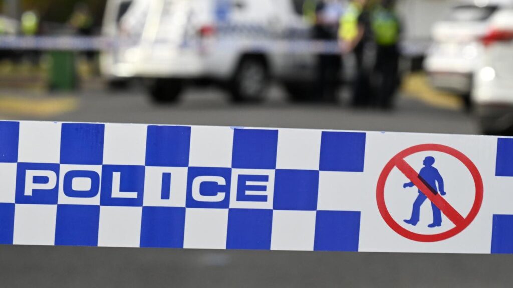 Police were called to an intersection in Cairns after one of their vehicles struck a woman.

