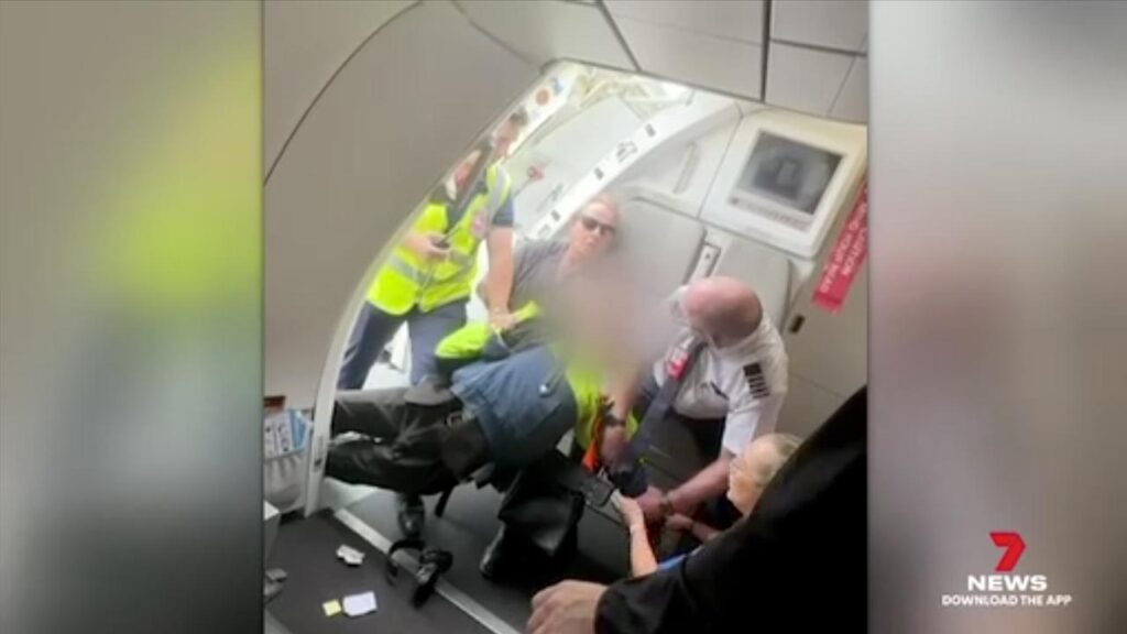 A 17-year-old boy was apprehended and accused of taking a gun and fake bomb onto a plane.
