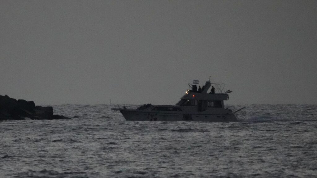 Israeli naval forces sailed confiscated Gaza-bound boats into port after intercepting them.
