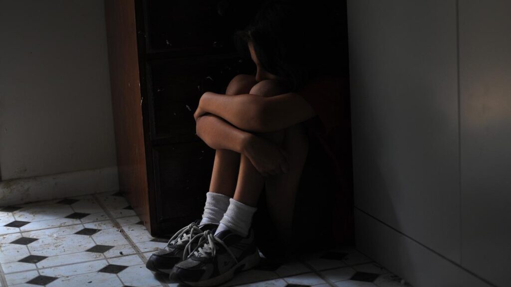 A woman, 40, will face court accused of torturing a 10-year-old girl who remains in hospital.
