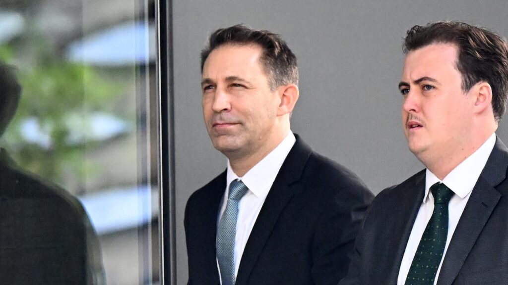 Robert John Crawford (left) appeared in the Supreme Court even though he was not required to.
