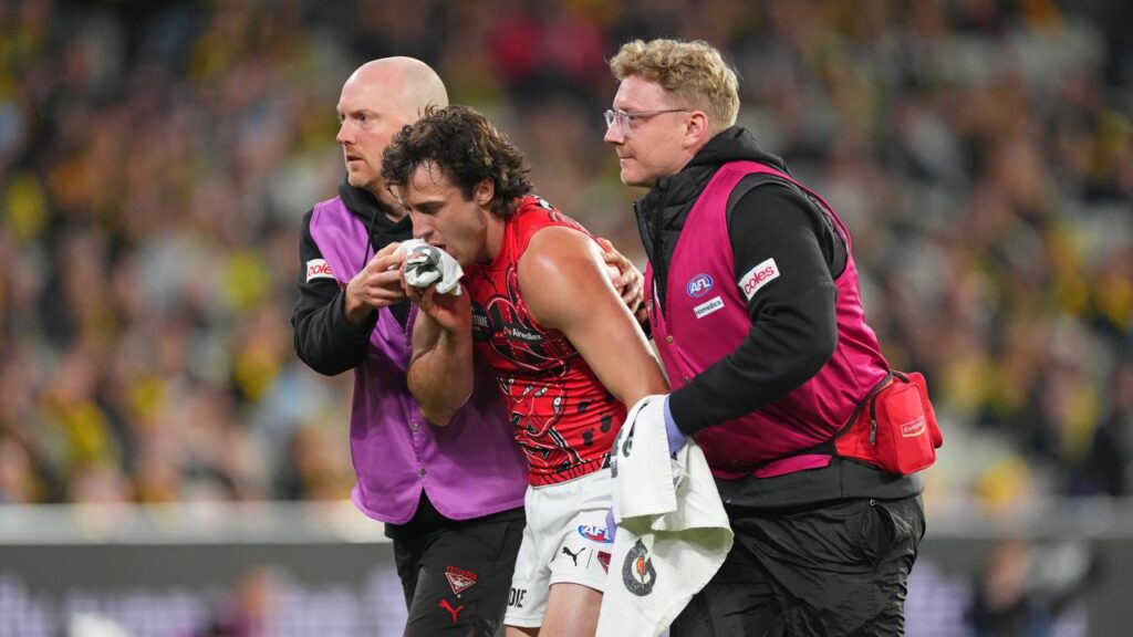 Bombers’ Andrew McGrath suffered a badly broken jaw in the loss to Richmond.
