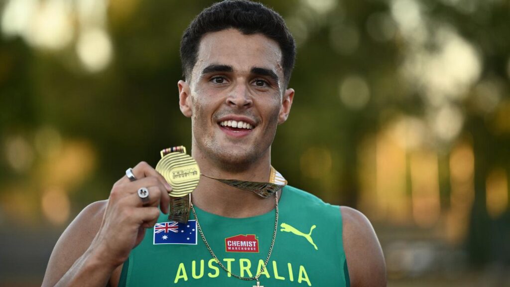 Aidan Murphy was all smiles after doing the sprint double at the Oceania championships. 

