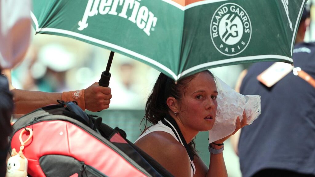 Daria Kasatkina cools herself at a changeover but. couldn’t cope with Aryna Sabalenka’s hot form.
