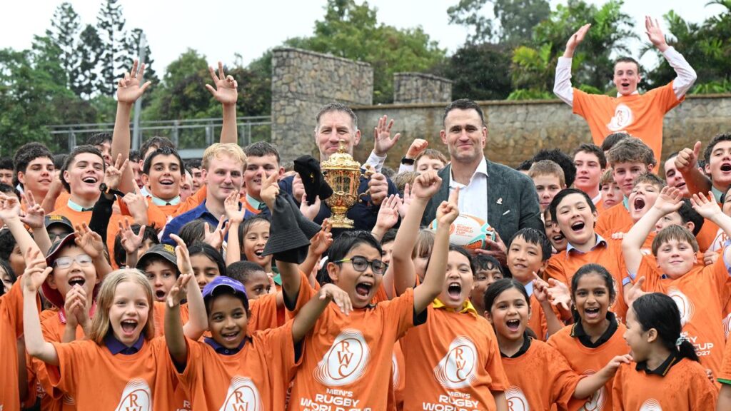 Tom Lynagh, Brad Thorn and James Horwill with the Webb Ellis Cup, 500 days out from the World Cup.
