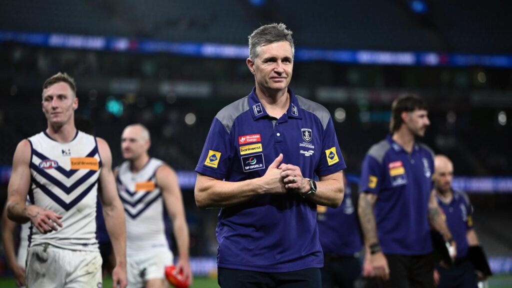 Justin Longmuir’s Dockers are on a 10-match winning streak as they head to the Gabba.
