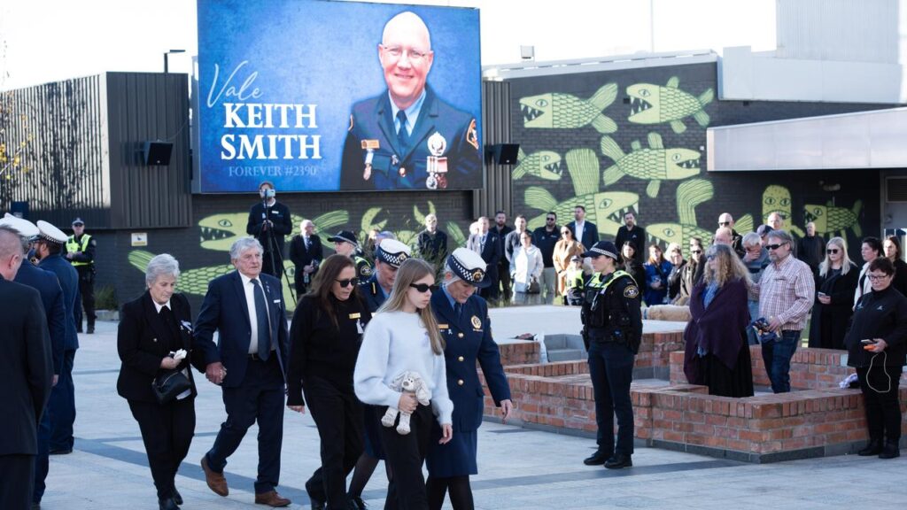 Veteran officer Keith Smith was farewelled with full ceremonial police honours.
