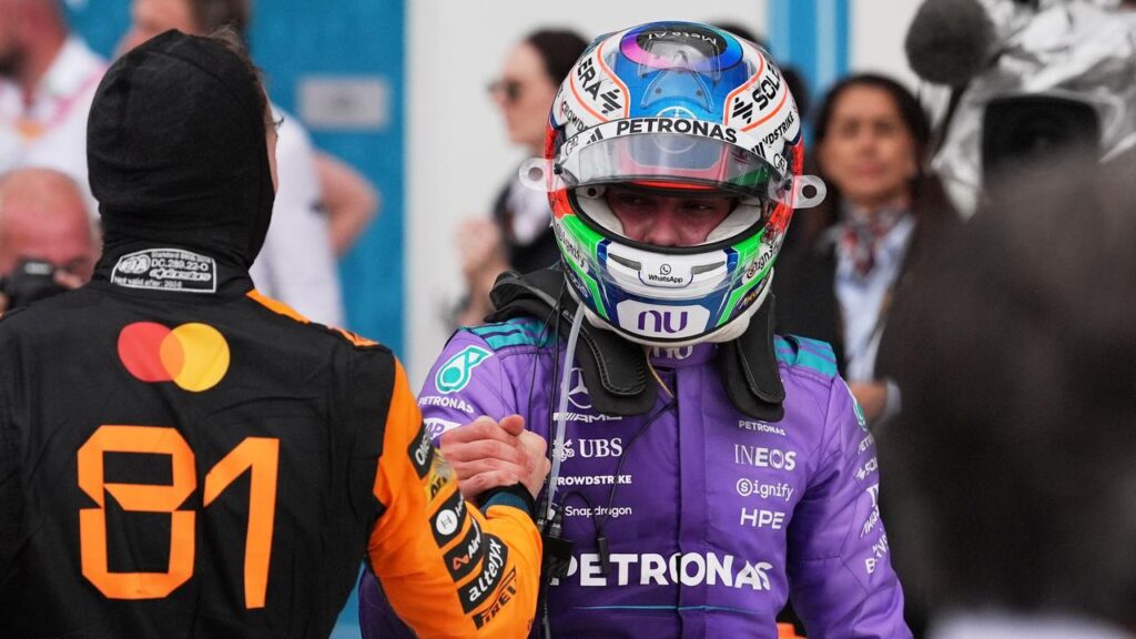 McLaren’s No.81 Oscar Piastri congratulates Miami Grand Prix winner Kimi Antonelli.
