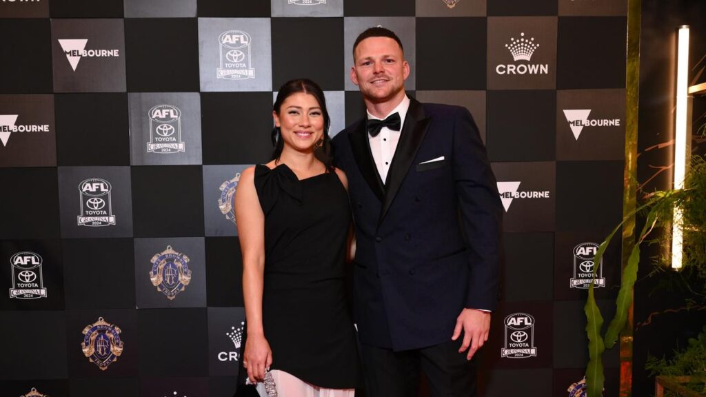 Steven May’s partner Sachi Dade alleges Melbourne Football Club committed serious privacy breaches.
