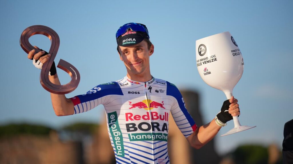 Third-placed Jai Hindley celebrates his landmark podium finish at the Giro d’Italia.
