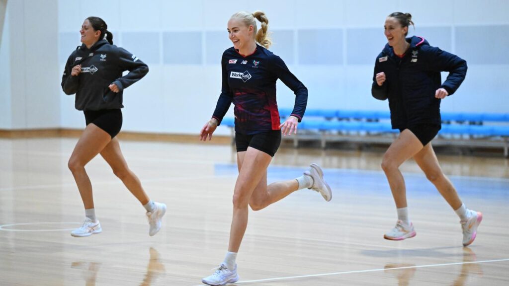 Jo Weston (centre) and her Melbourne Vixens teammates go through their paces before the grand final.

