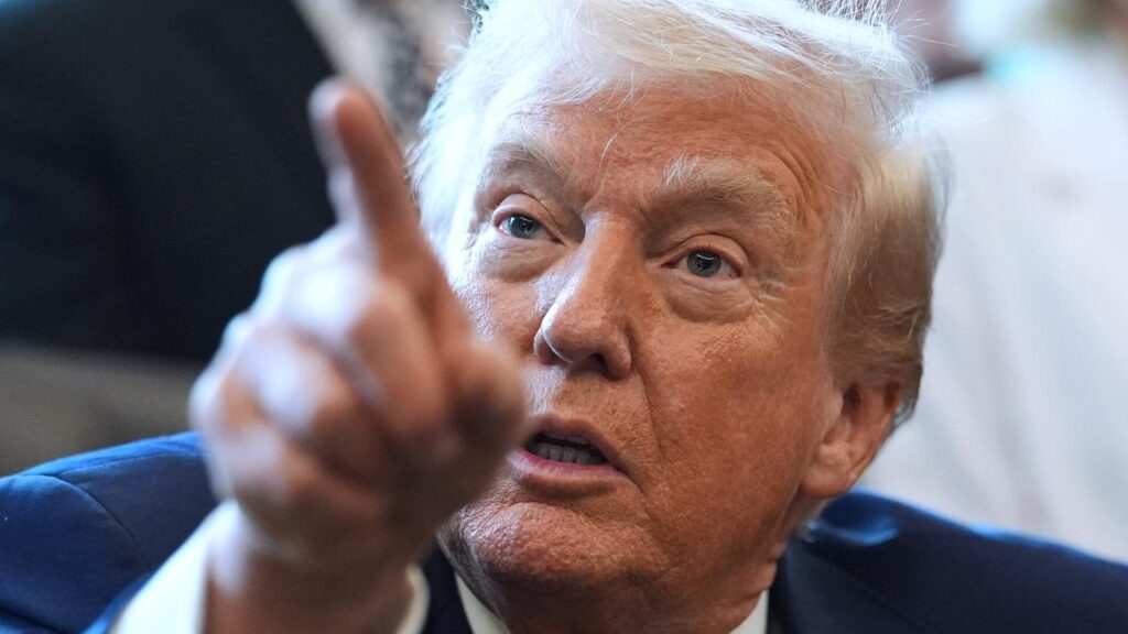 President Trump says the US must react to the downing of a US helicopter near the Strait of Hormuz.
