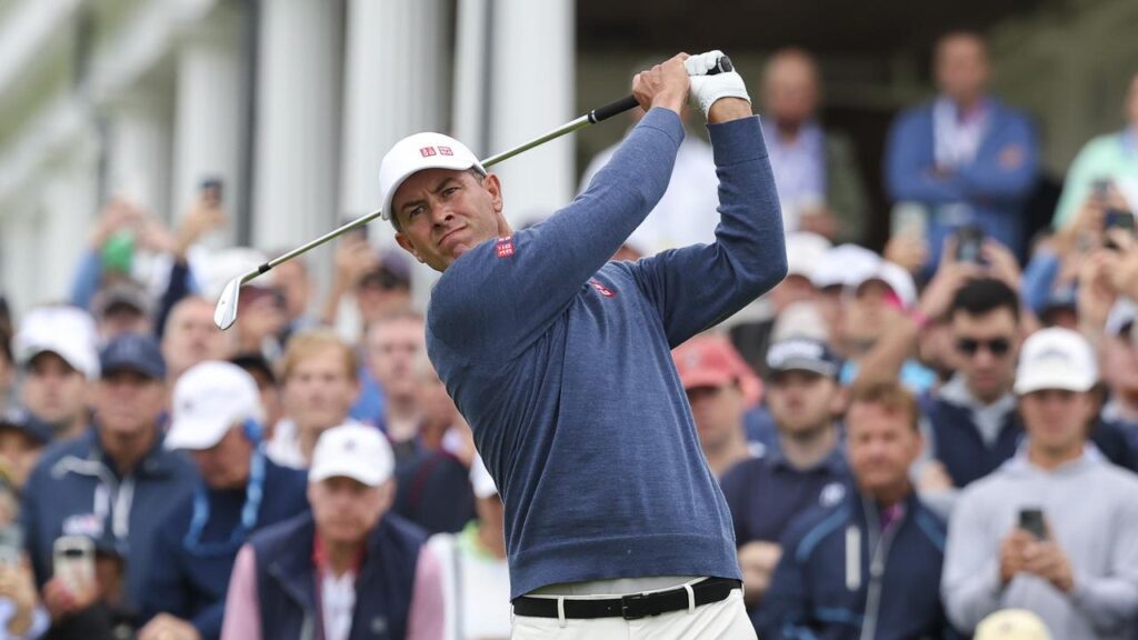 Adam Scott tees off in the US Open on his historic 100th consecutive start at a major.
