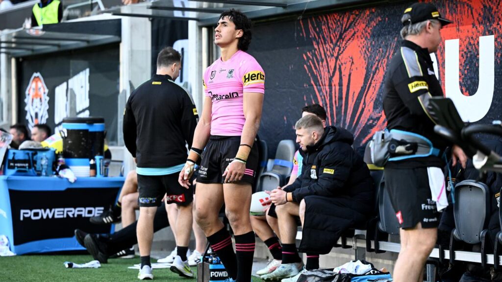 Penrith’s Casey McLean watched from the sidelines after injuring his ankle against the Tigers.
