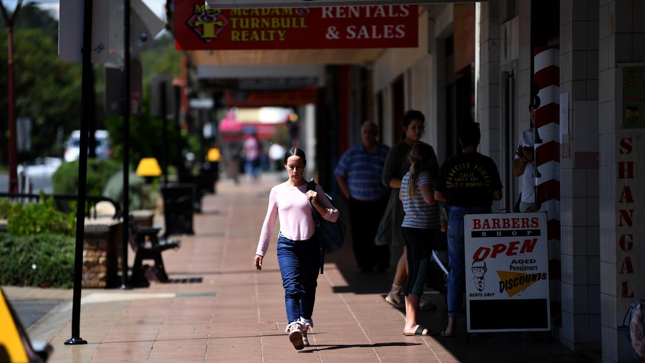 A woman walks through a street in Toowoomba (file image)
