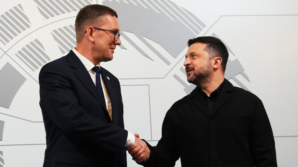 Estonian Prime Minister Kristen Michal greets Volodymyr Zelenskiy at the NB8 summit in Tallinn.
