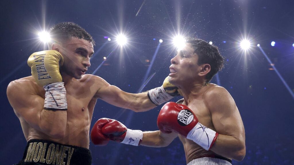 Andrew Moloney (left) is back under the bright lights and will fight for a world title in Japan. 

