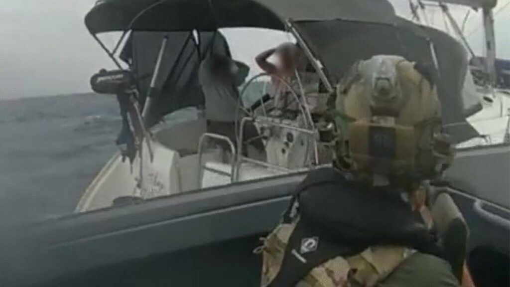 Tactical response group police intercepted three people in a boat off the coast of Exmouth.
