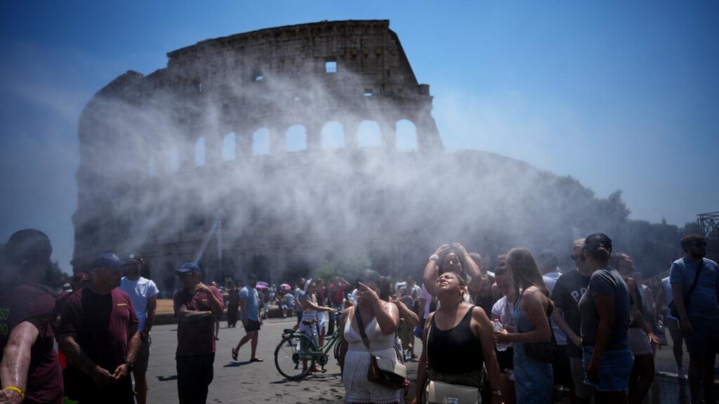 A water-sprinkling cannon was enlisted to cool down tourists visiting Rome’s Colosseum.
