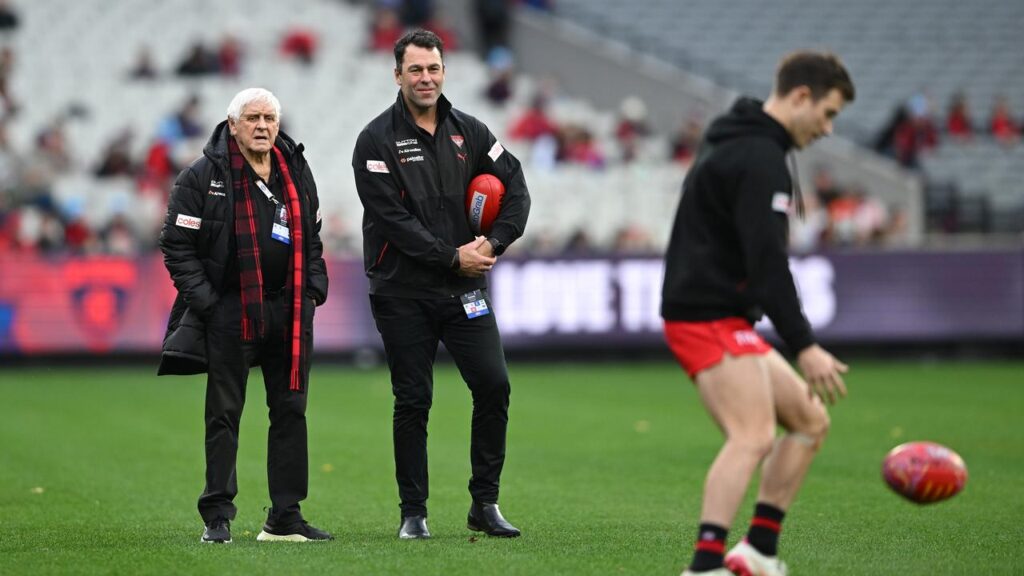 Essendon interim coach Dean Solomon (centre) says he’s only focused on his current role at the club.
