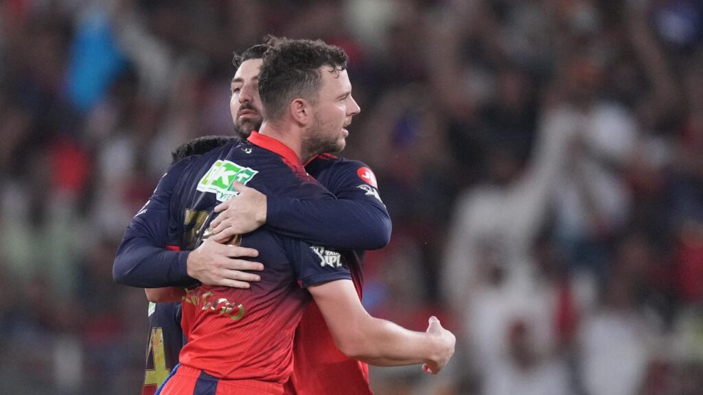 RCB’s Josh Hazlewood being hugged by Tim David after dismissing Shubman Gill in the IPL final.
