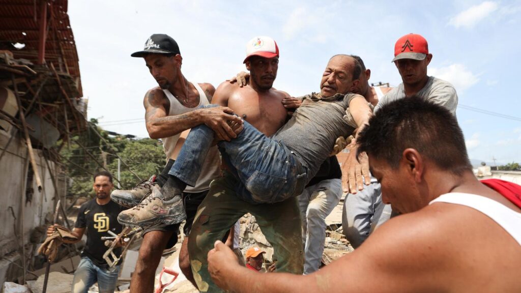 Venezuelans are making frantic efforts to find survivors amid the rubble of destroyed buildings.
