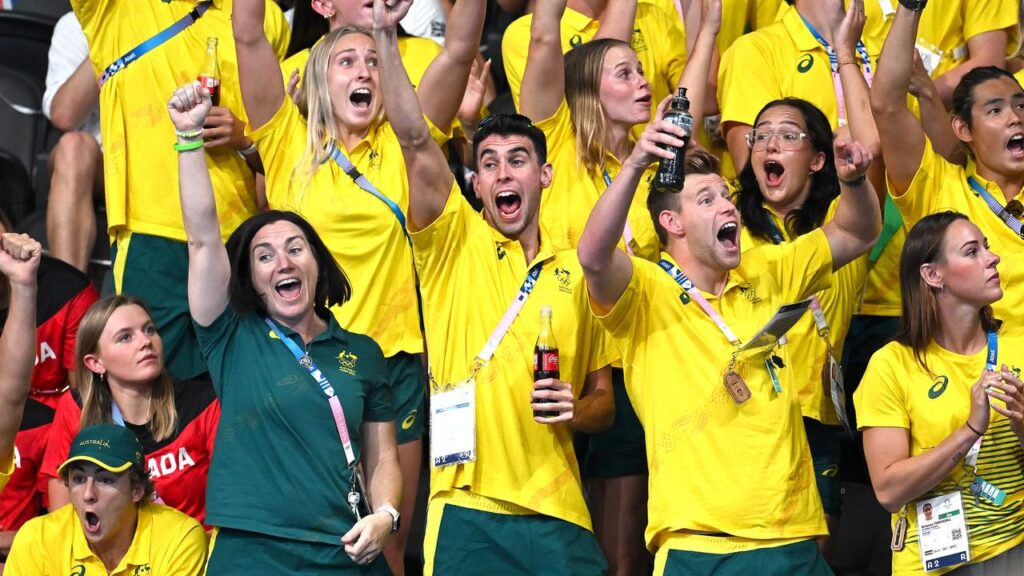 Australia’s Olympic chef de mission Anna Meares and athletes cheer along at the 2024 Paris Games.
