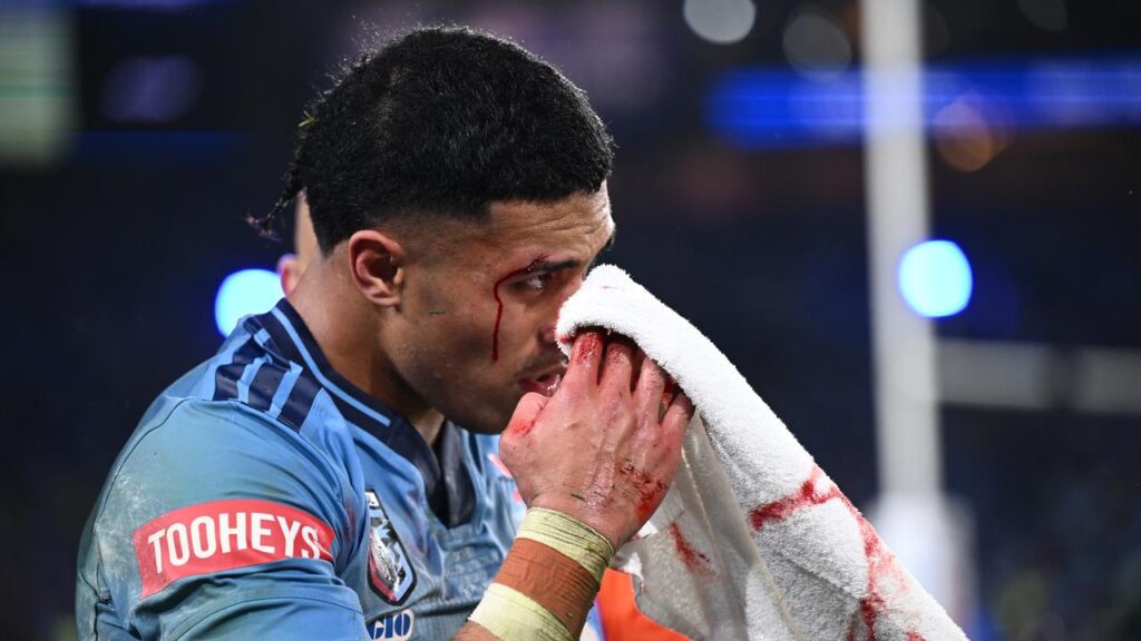 Tolu Koula left the field after being flattened in State of Origin game one.
