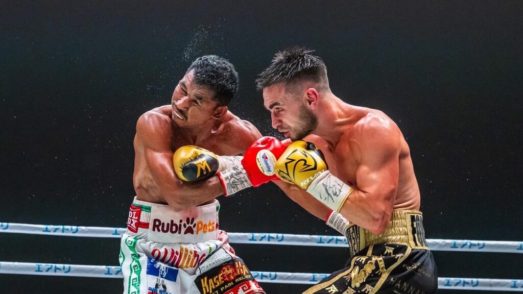 Andrew Moloney (right) won plenty of fans in his world title win on Japanese debut.
