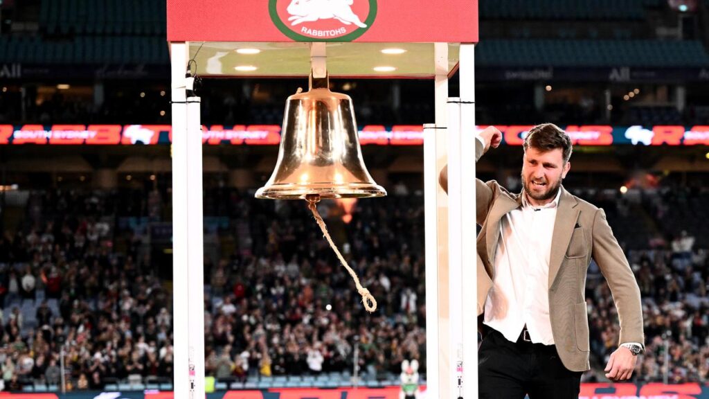 Jai Arrow rings the Rabbitohs’ Legacy Bell ahead of the match between South Sydney and Brisbane.
