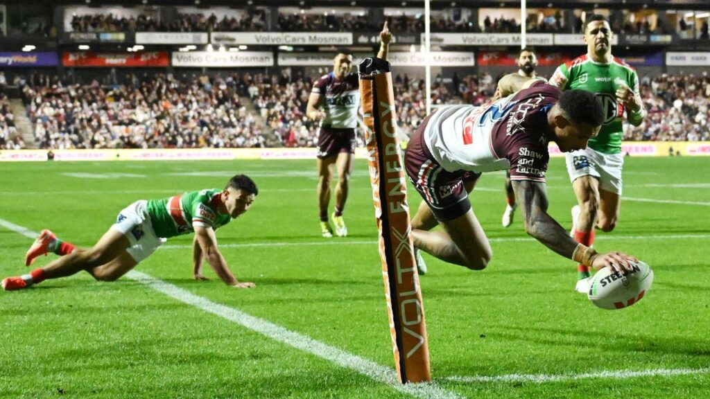 Manly winger Jason Saab scores his second try as the Sea Eagles beat South Sydney.
