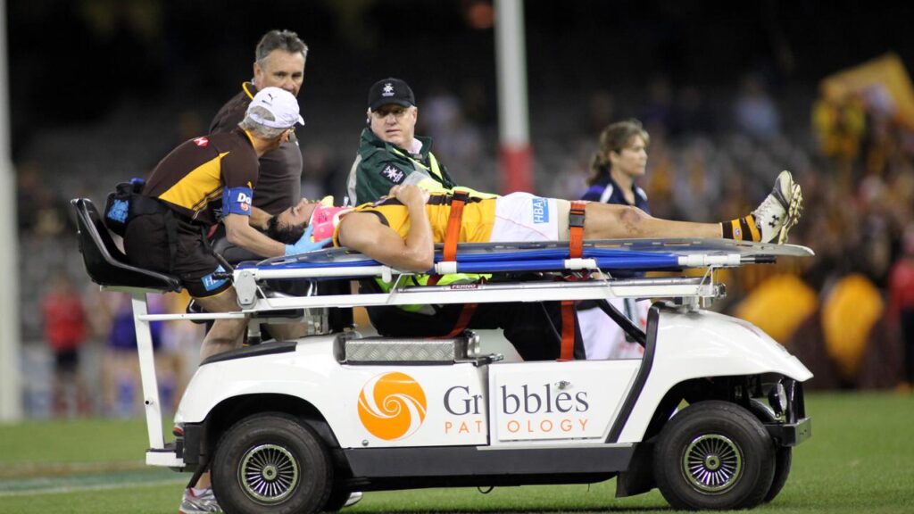 Jordan Lewis is stretchered off the ground after he was knocked out in a 2010 match. 
